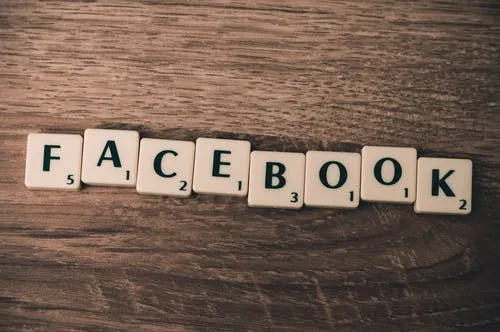 scrabble letters forming facebook word